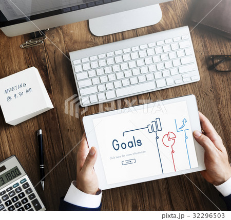Hands working on digital device network graphic overlay 32296503