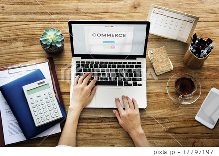 Hands working on laptop network graphic overlay 32297197