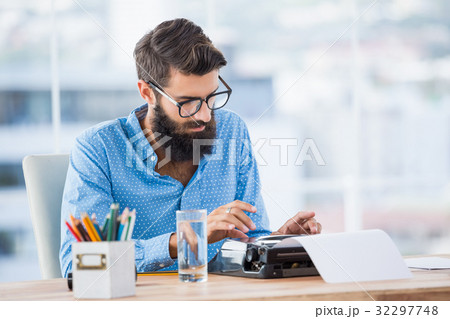 Hipster using type writer Hipster using type writer 32297748