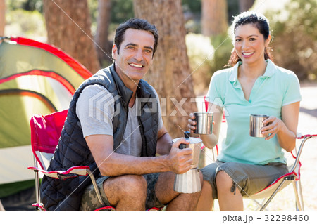 Couple sitting and taking some drink Couple sitting and taking some drink 32298460
