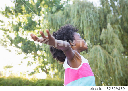 Child with arms outstretched 32299889
