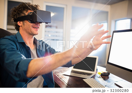 Businessman wearing virtual glasses 32300280