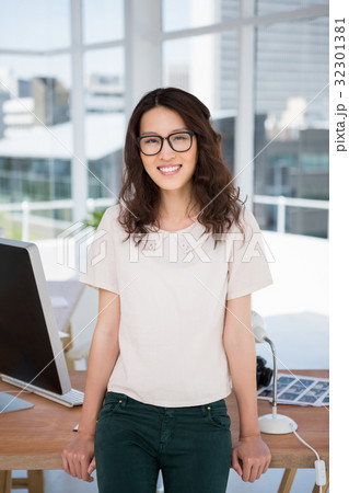 A business woman is standing A business woman is standing 32301381