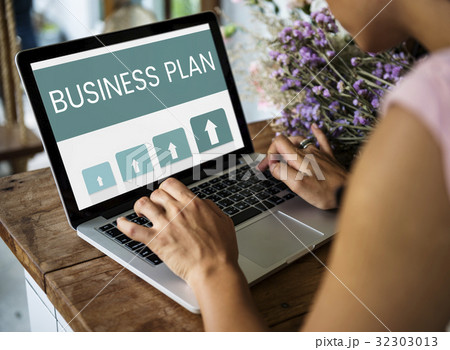 Woman working on laptop network graphic overlay 32303013
