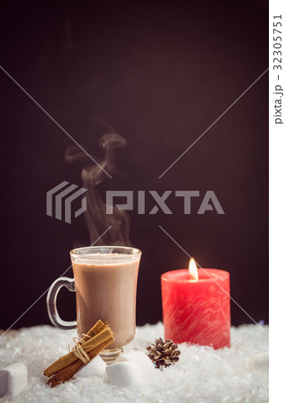 close up view of composite image of hot chocolate and candle 32305751