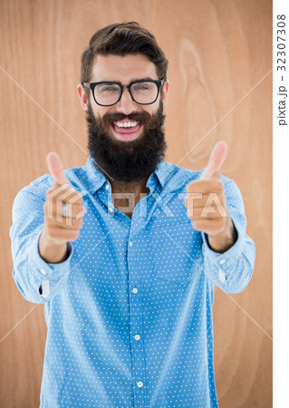 Hipster with thumbs up 32307308