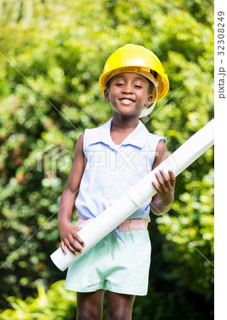 Cute mixed-race girl wearing handyman clothes Cute mixed-race girl wearing handyman clothes 32308249