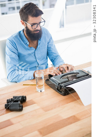 Hipster using type writer 32308341