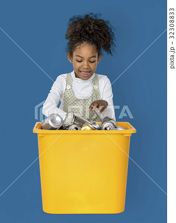 Little Girl Separating Recyclable Metal Can Studio Portrait 32308833