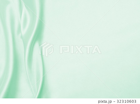 Smooth elegant green silk or satin luxury cloth Smooth elegant green silk or satin luxury cloth 32310603