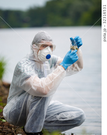 Laboratory assistant with test tube 32316531