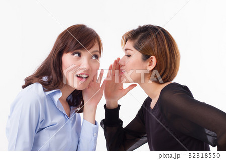 woman gossiping, whispering, listening to rumor 32318550