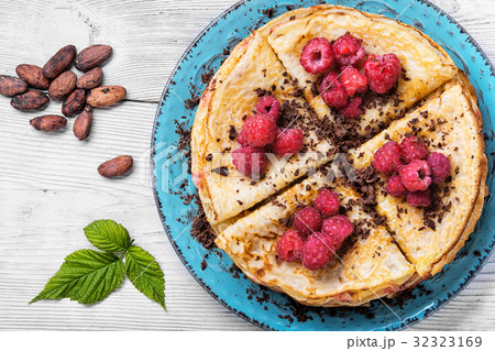 Rural Pancakes with fresh raspberries Rural Pancakes with fresh raspberries 32323169