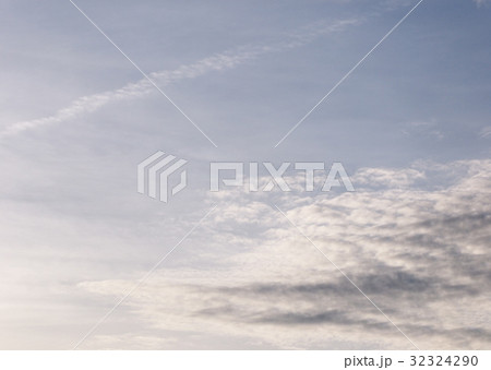 high white clouds in winter with clear blue sky. high white clouds in winter with clear blue sky. 32324290