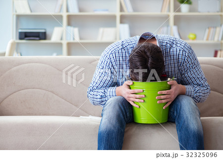 Man suffering from sick stomach and vomiting Man suffering from sick stomach and vomiting 32325096