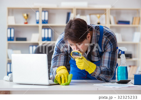 Looking for dust with magnifying glass 32325233