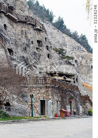 road and carved slope in Longmen Grottoes road and carved slope in Longmen Grottoes 32326246