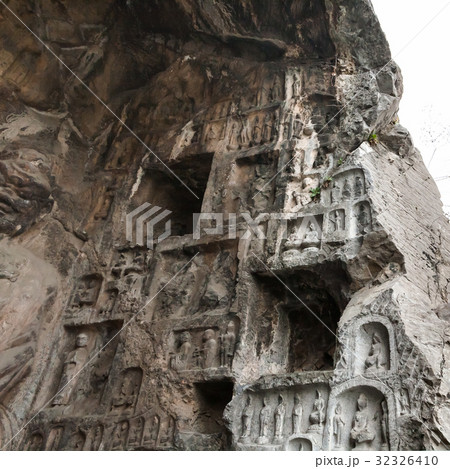 carved figures and rooms in West Hill in Longmen 32326410