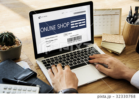 Hands working on laptop network graphic overlay Hands working on laptop network graphic overlay 32330768