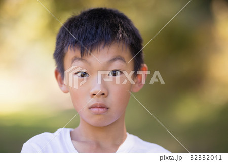 Portrait of little boy in forest 32332041
