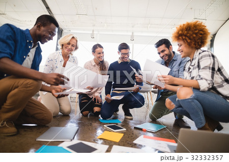 Happy business team working together at office 32332357