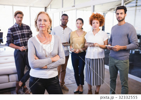 Portrait of confident colleagues in office Portrait of confident colleagues in office 32332555