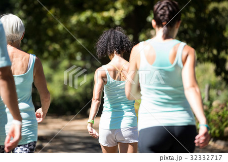 Marathon athletes walking in the park Marathon athletes walking in the park 32332717