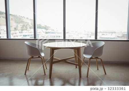 View of empty chairs and table View of empty chairs and table 32333361