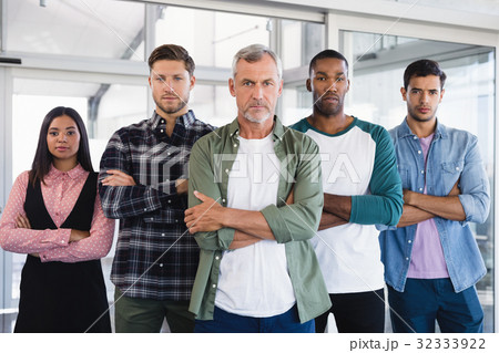 Portrait of business people with arms crossed Portrait of business people with arms crossed 32333922