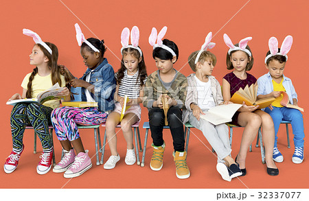 A bunny team reading a book 32337077