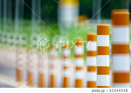 Flexible traffic bollard for bike lane. Flexible traffic bollard for bike lane. 32344538