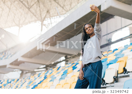 Charming afro-american sportgirl is taking selfie Charming afro-american sportgirl is taking selfie 32349742
