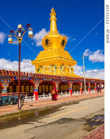 Buddhist nuns walking at the stupas Buddhist nuns walking at the stupas 32352108