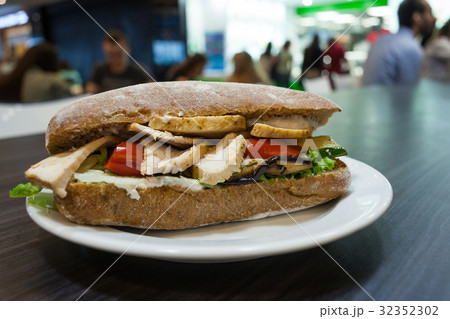 Sandwich on a plate in a cafe 32352302