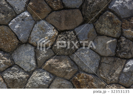 the Rock wall seamless texture. Design background the Rock wall seamless texture. Design background 32353135
