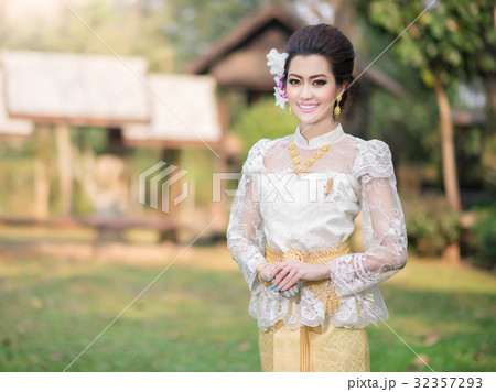 Beautiful Thai girl in Thai traditional costume Beautiful Thai girl in Thai traditional costume 32357293