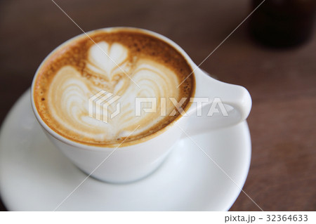 cappuccino coffee on wood background 32364633