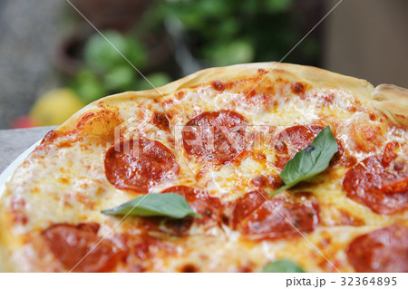 pepperoni pizza on wood background 32364895