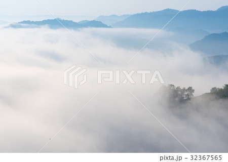 View of amazing mist moving over mountains  32367565