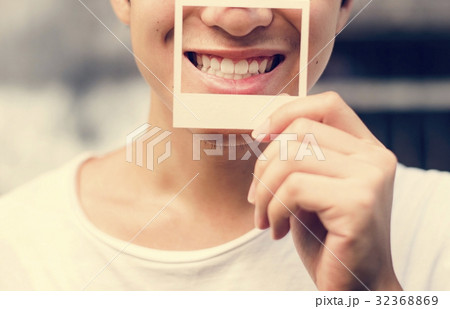 Asian Guy Holding Photo Frame Smiling Asian Guy Holding Photo Frame Smiling 32368869