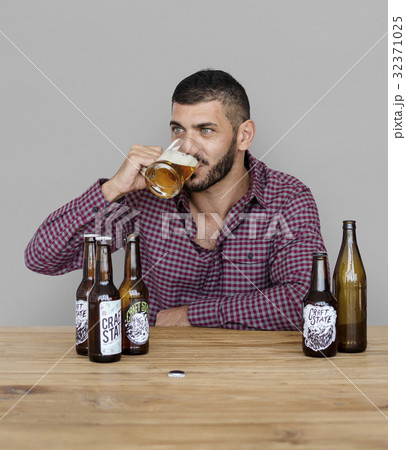 Middle Eastern Man Beer Drinks Alocohol Studio Portrait 32371025