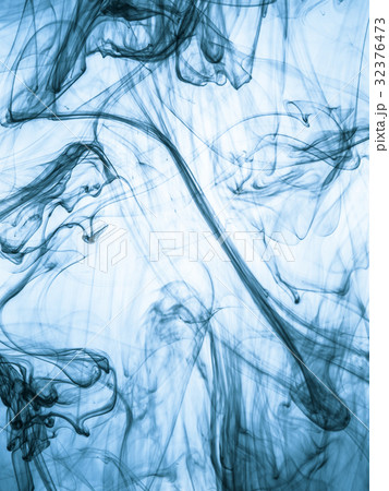 Ink swirl in a water on color background. The 32376473