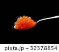 Red caviar on a spoon 32378854