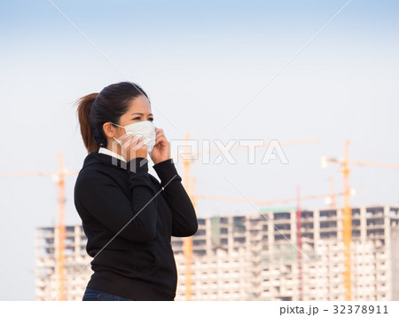 asian woman wearing face mask asian woman wearing face mask 32378911