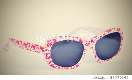 Sunglasses. Baby, pink-white colorful glasses. Sunglasses. Baby, pink-white colorful glasses. 32379145