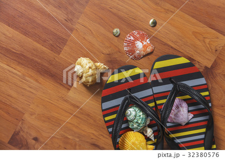 Slipper with seashell 32380576