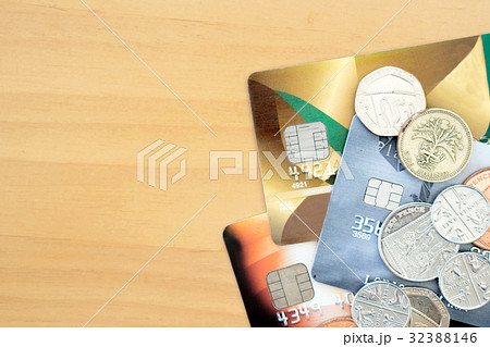 Credit cards,coins, close-up view Credit cards,coins, close-up view 32388146