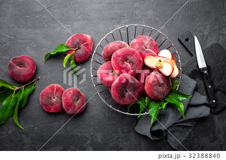 Peach, fresh peaches with leaves Peach, fresh peaches with leaves 32388840