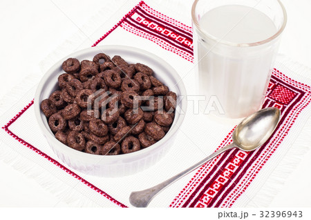 Chocolate ringlets with milk for breakfast Chocolate ringlets with milk for breakfast 32396943