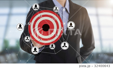Businessman pressing button marketing goals  32400643